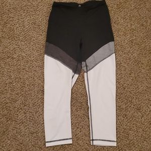 Black, gray, and white Capri leggings